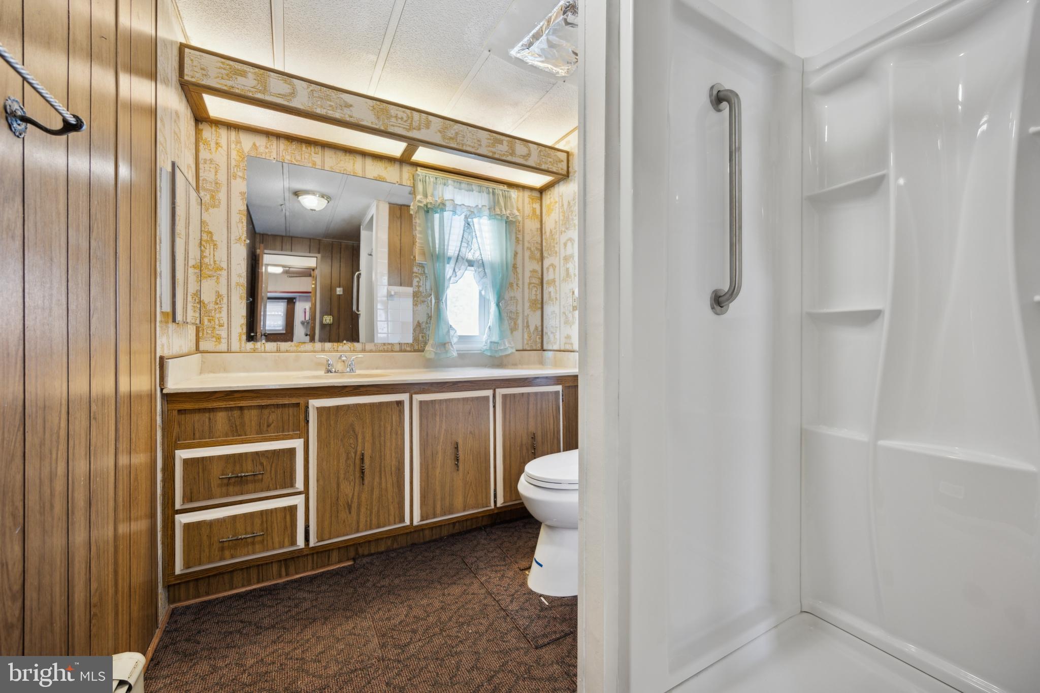 4140 Davis Drive Morrisville, PA 19067 - Photo 13 of 14 a bathroom with a sink and a mirror