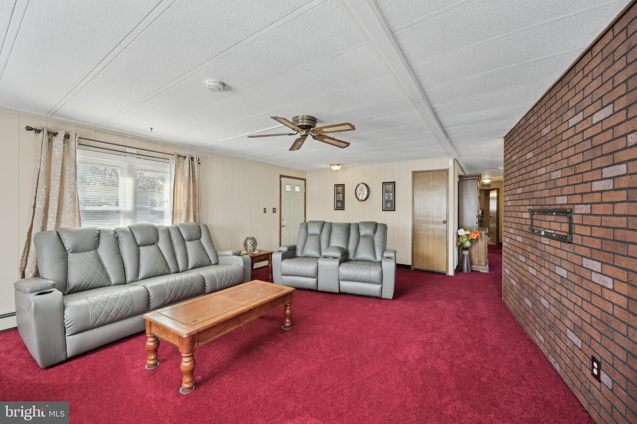 4140 Davis Drive Morrisville, PA 19067 - Photo 3 of 14 a living room with furniture and a wooden floor