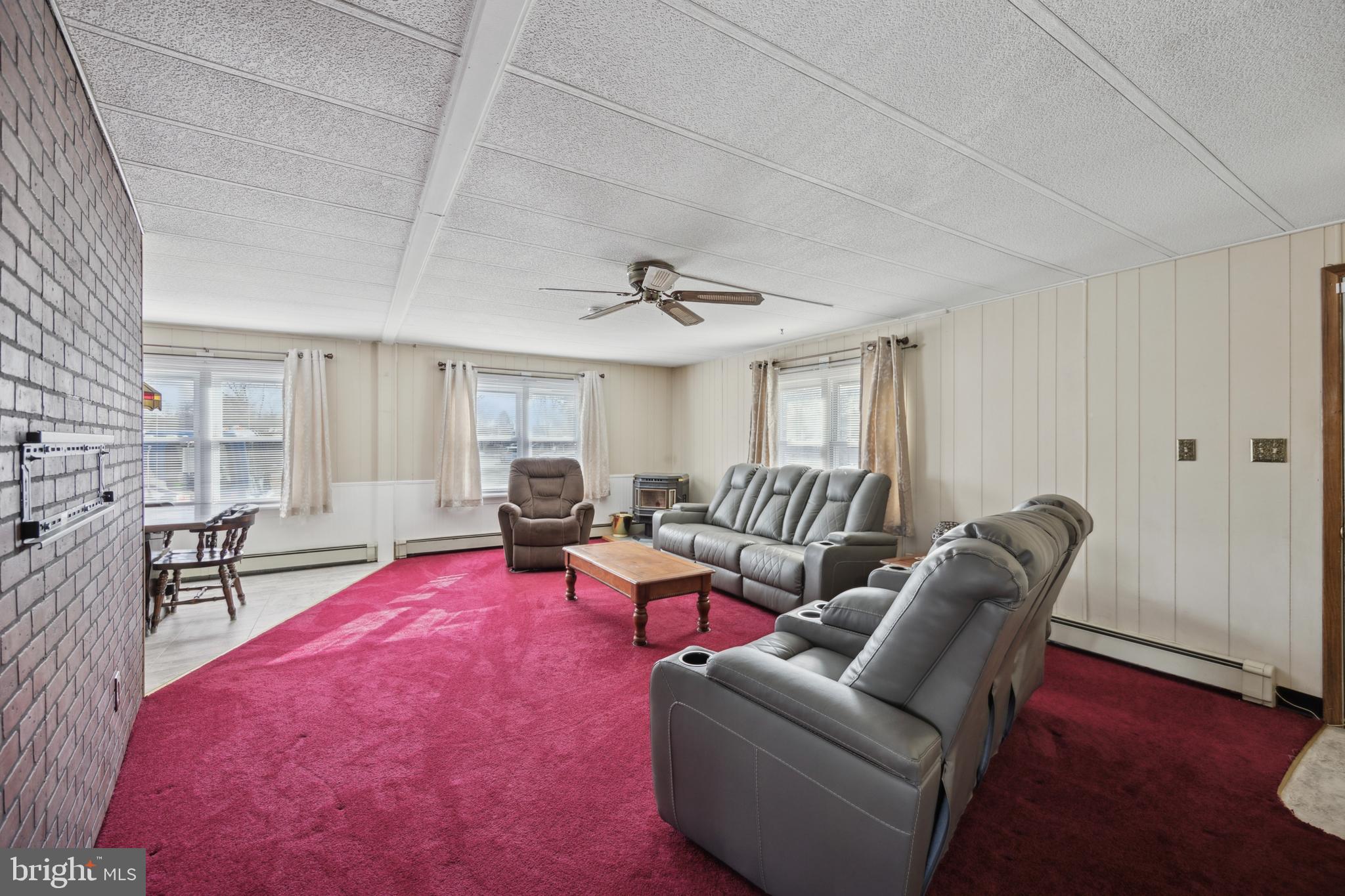 4140 Davis Drive Morrisville, PA 19067 - Photo 4 of 14 a living room with furniture and a wooden floor