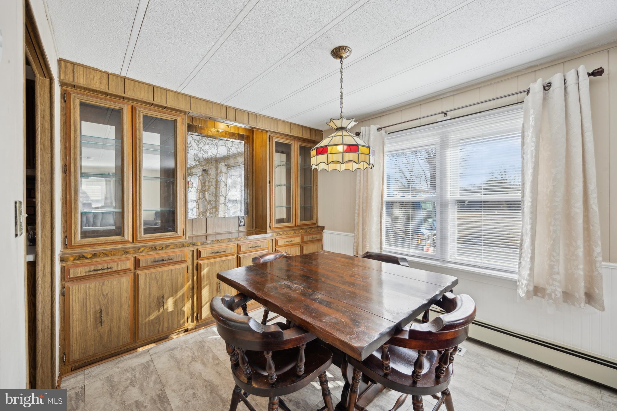 4140 Davis Drive Morrisville, PA 19067 - Photo 5 of 14 a view of a dining room with furniture window and wooden floor