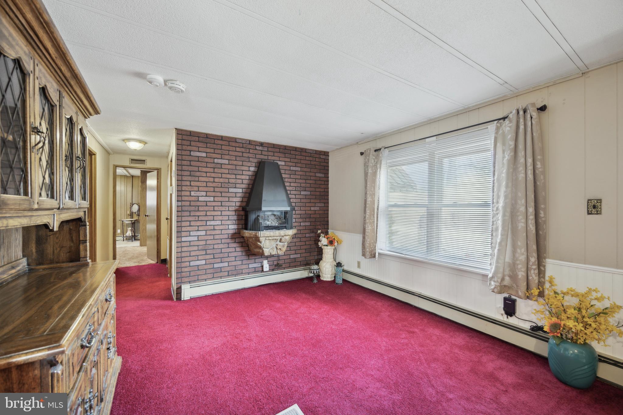 4140 Davis Drive Morrisville, PA 19067 - Photo 9 of 14 a view of empty room with floor to ceiling window and outdoor view