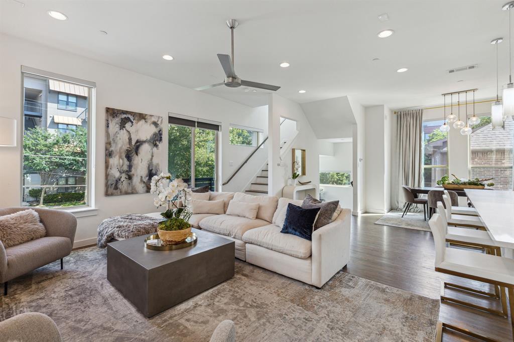 5015 Manett Street, Unit 101 Dallas, TX 75206 - Photo 1 of 25 a living room with furniture and a large window