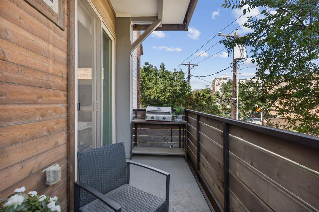 5015 Manett Street, Unit 101 Dallas, TX 75206 - Photo 15 of 25 a view of balcony with wooden floor
