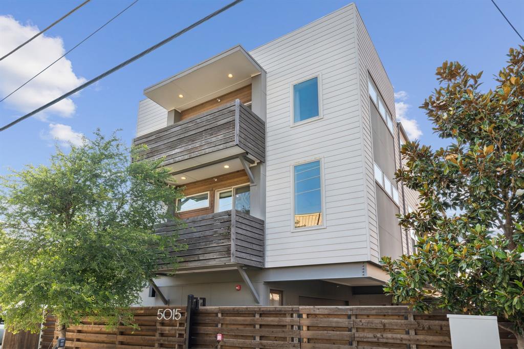 5015 Manett Street, Unit 101 Dallas, TX 75206 - Photo 2 of 25 a view of a house with a tree