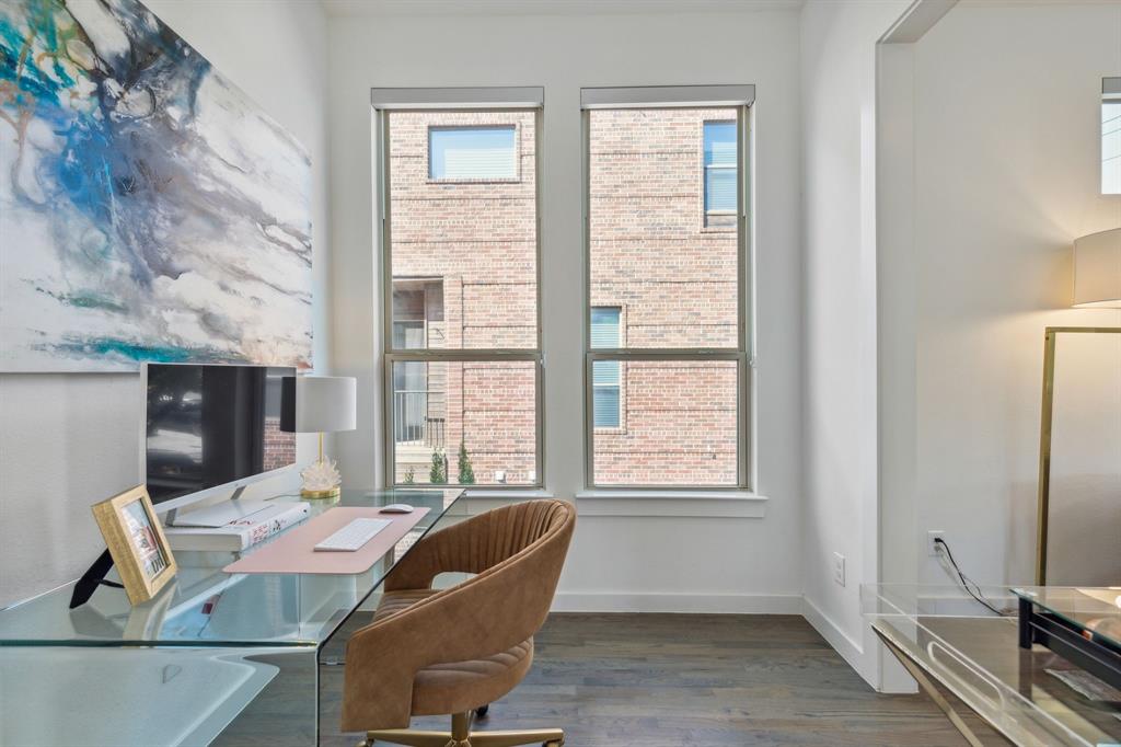 5015 Manett Street, Unit 101 Dallas, TX 75206 - Photo 10 of 25 a workspace with furniture and a window