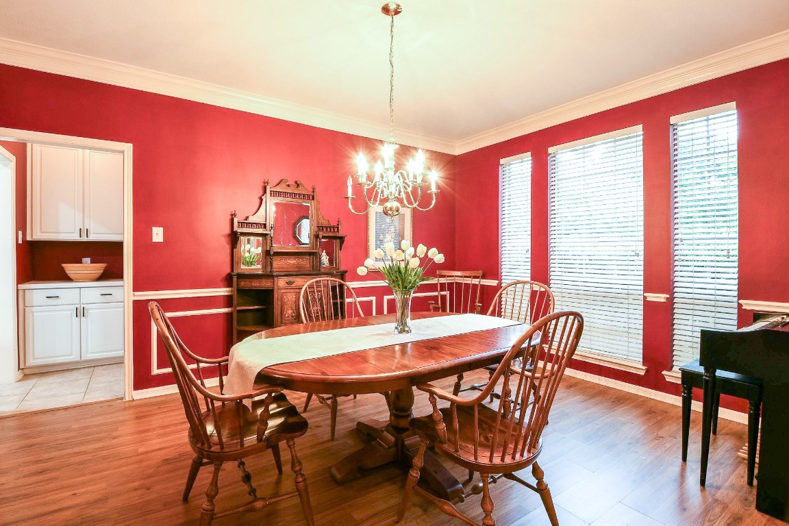 20423 Forest Drive Spring, TX 77388 - Photo 25 of 49 a view of a dining room with furniture window and wooden floor