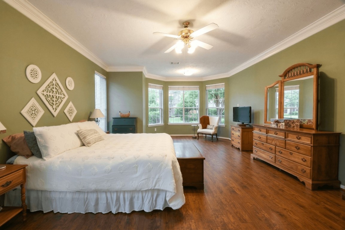 20423 Forest Drive Spring, TX 77388 - Photo 26 of 49 The primary bedroom features a sitting area that can be used as an exercise space, sitting area or as for whatever you need it to be