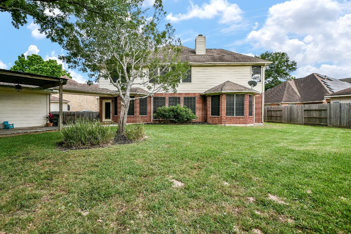 20423 Forest Drive Spring, TX 77388 - Photo 42 of 49 front view of a house with a yard