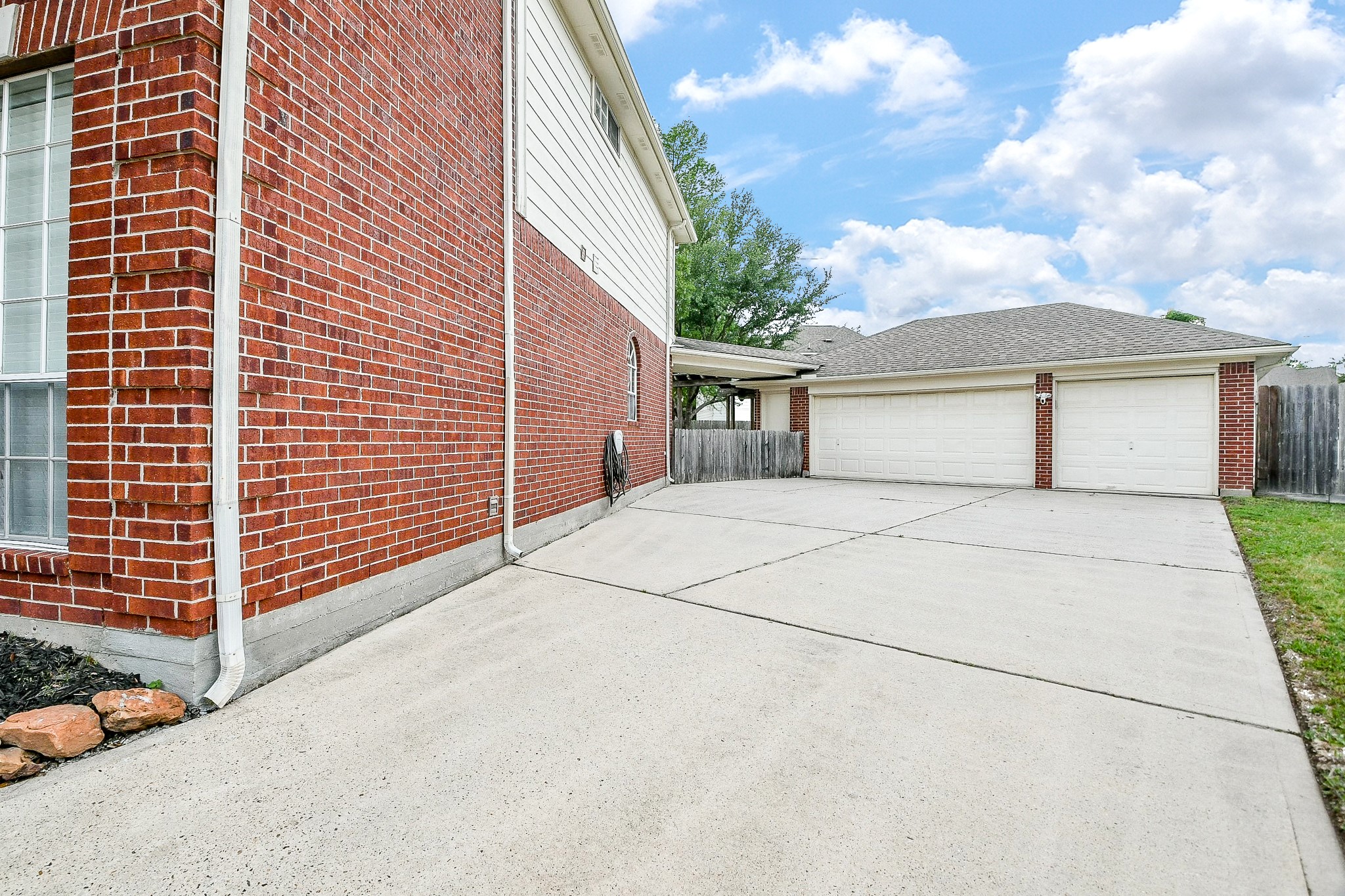 20423 Forest Drive Spring, TX 77388 - Photo 49 of 49 Lastly, there is a 3 car garage with additional storage built in.