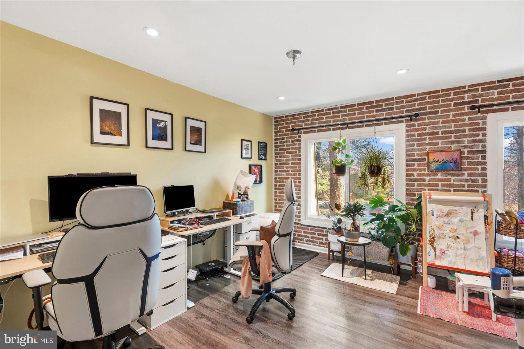 5239 West Running Brook Road, Unit 302 Columbia, MD 21044 - Photo 14 of 33 a work room with furniture and a potted plant