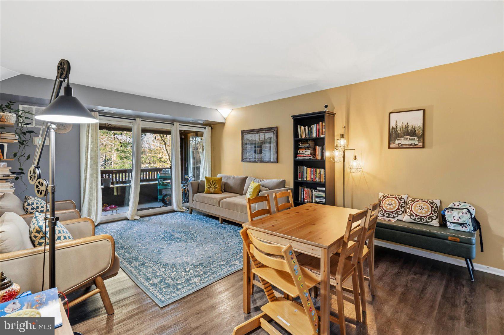 5239 West Running Brook Road, Unit 302 Columbia, MD 21044 - Photo 2 of 33 a living room with furniture and a window