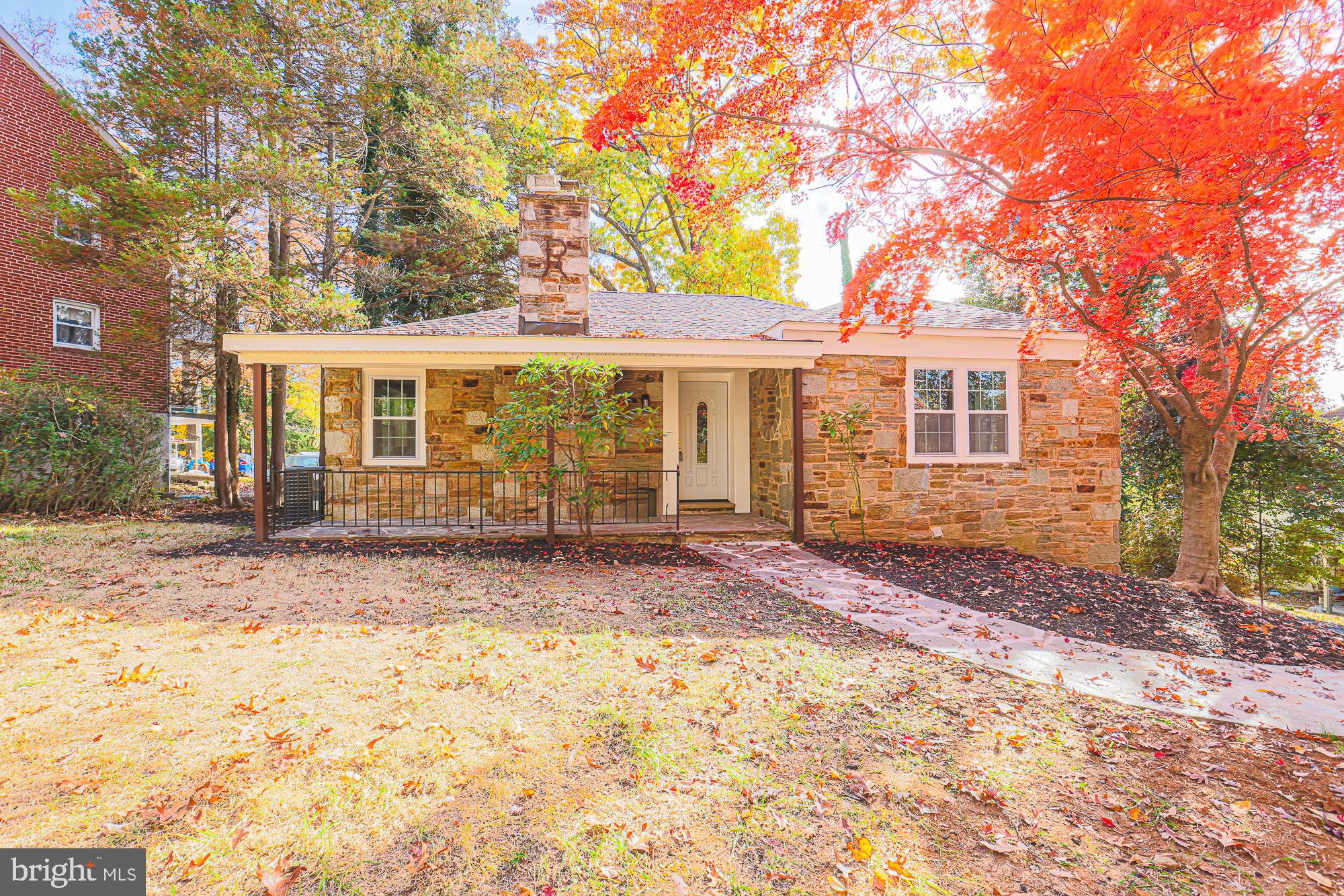 3641 Campfield Road Baltimore, MD 21207 - Photo 2 of 61 front view of a house with a yard