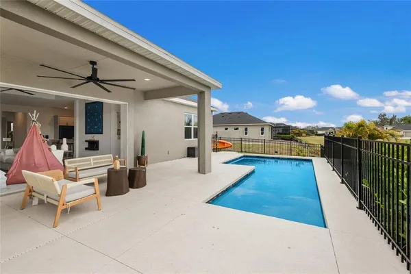 a view of a city with lawn chairs