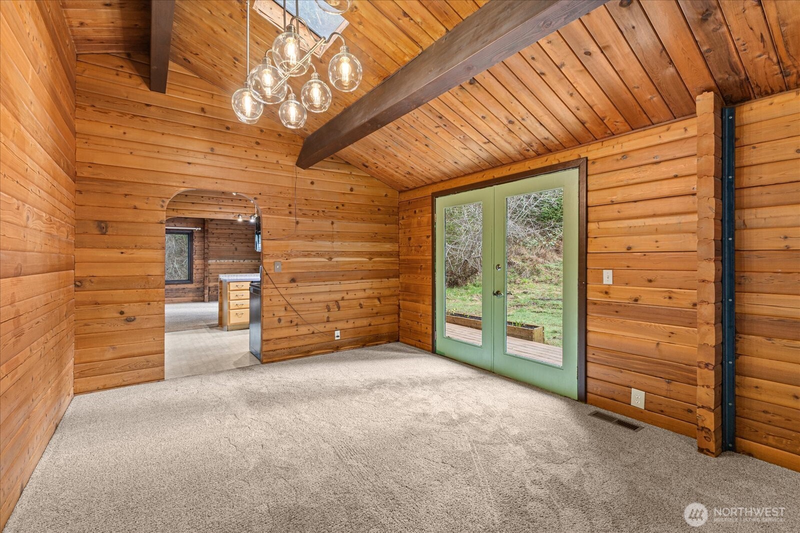 86 North Camano Ridge Road Camano Island, WA 98282 - Photo 16 of 33 a view of an empty room with a fireplace