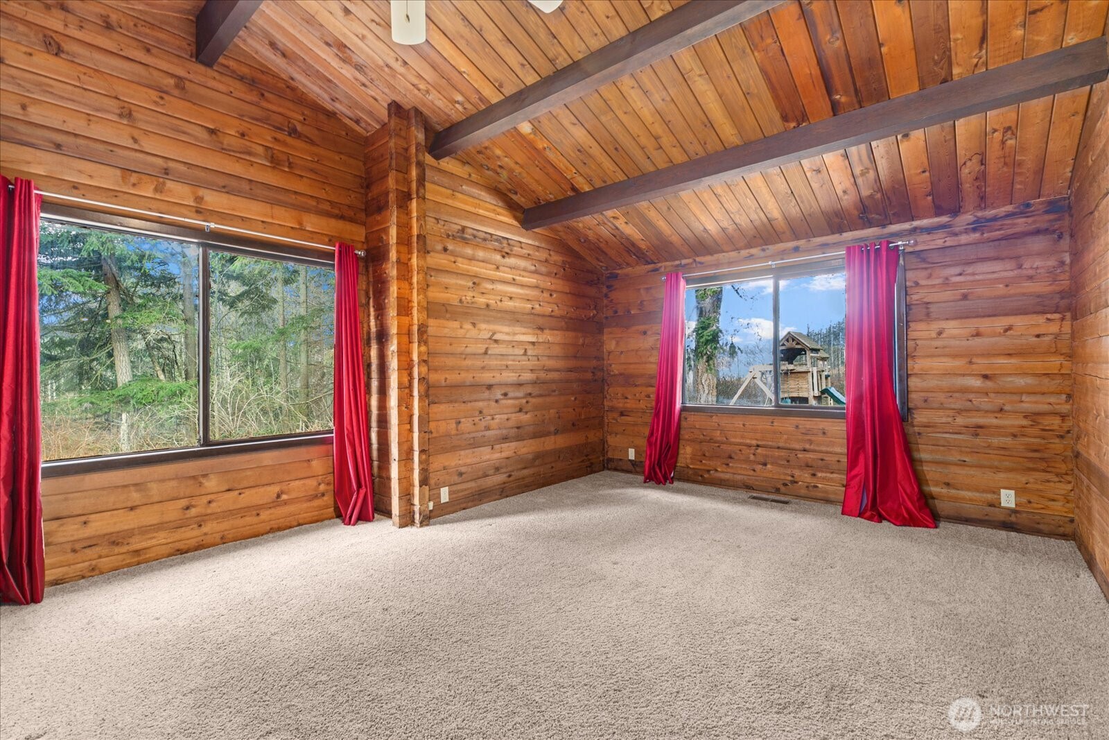 86 North Camano Ridge Road Camano Island, WA 98282 - Photo 17 of 33 a view of empty room with floor to ceiling window and carpet