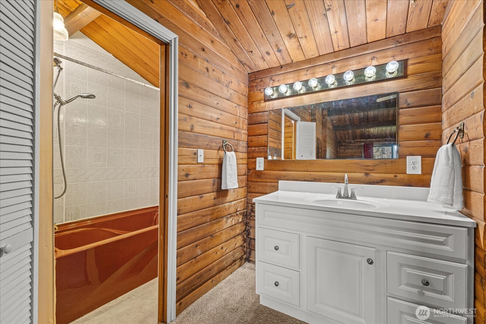 86 North Camano Ridge Road Camano Island, WA 98282 - Photo 19 of 33 a bathroom with a sink and a mirror