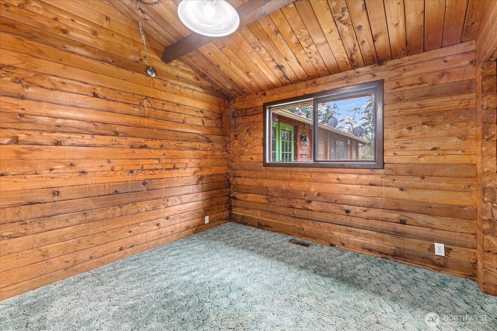 86 North Camano Ridge Road Camano Island, WA 98282 - Photo 20 of 33 a view of a wooden door and a window