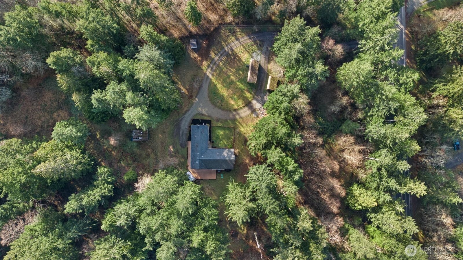 86 North Camano Ridge Road Camano Island, WA 98282 - Photo 30 of 33 an aerial view of a house with a yard