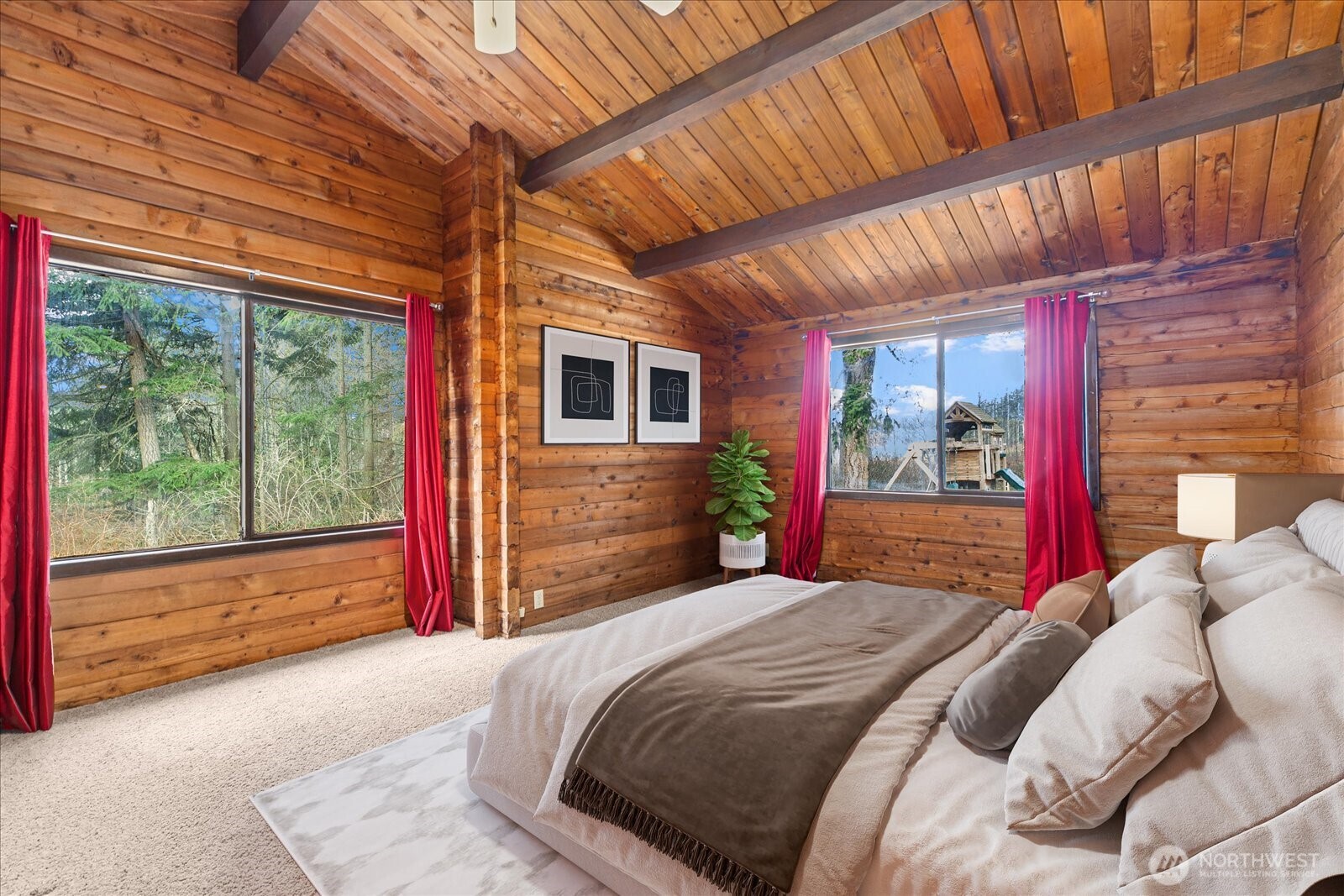 86 North Camano Ridge Road Camano Island, WA 98282 - Photo 5 of 33 a bed sitting in a bedroom next to a window