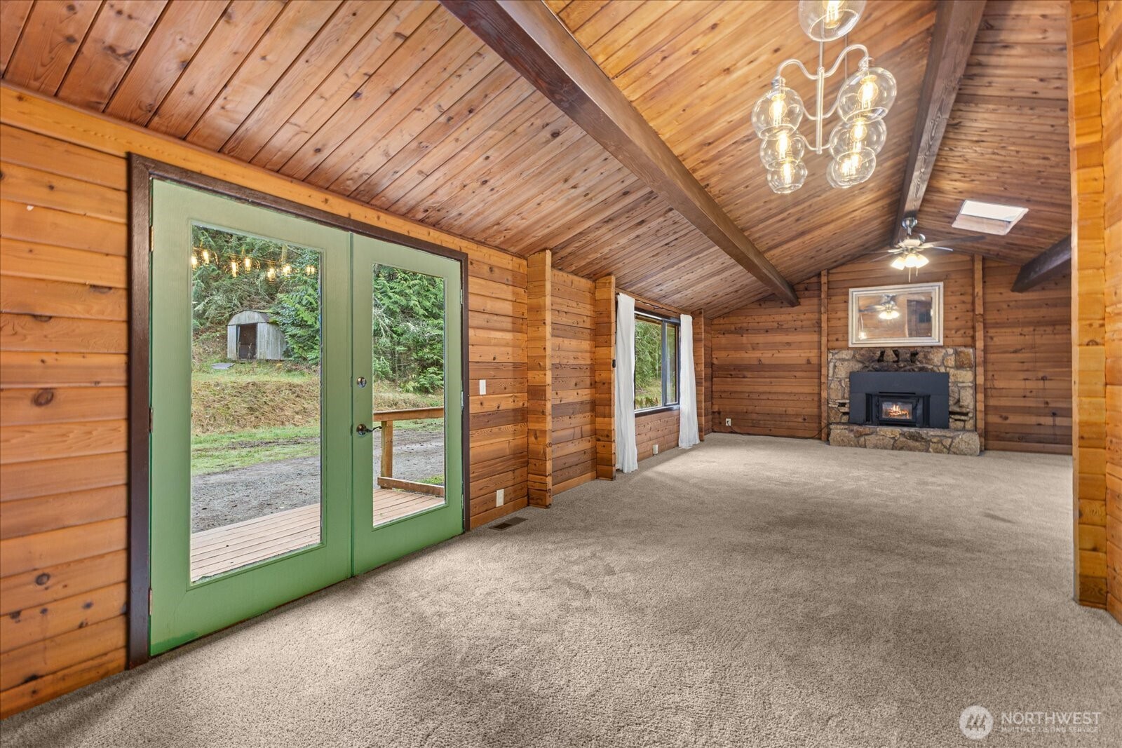 86 North Camano Ridge Road Camano Island, WA 98282 - Photo 9 of 33 a view of an empty room with a balcony