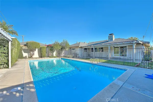 a view of a house with swimming pool