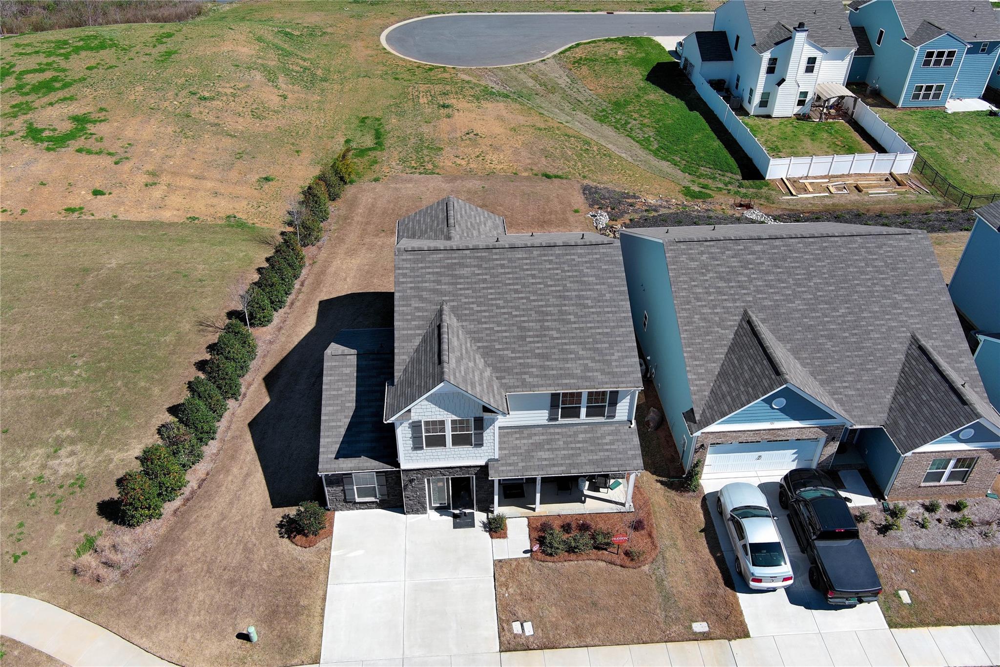 717 Alexander Commons Drive Monroe, NC 28112 - Photo 32 of 33 an aerial view of a house with swimming pool