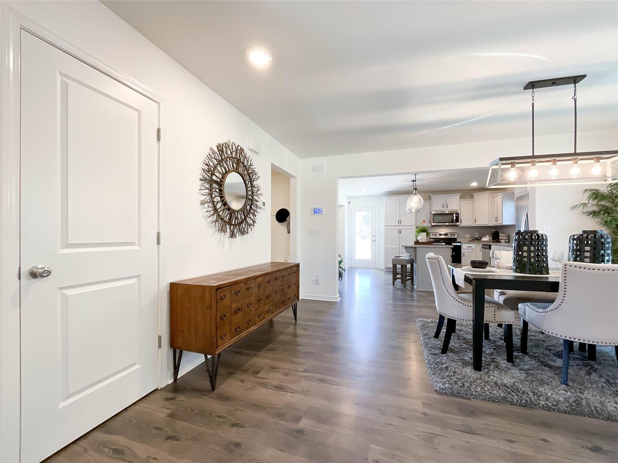 717 Alexander Commons Drive Monroe, NC 28112 - Photo 5 of 33 a view of a dining room with furniture