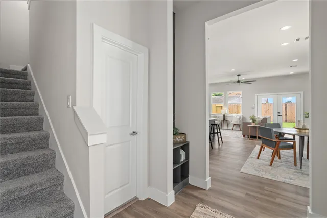 a bathroom with a toilet a sink and a mirror