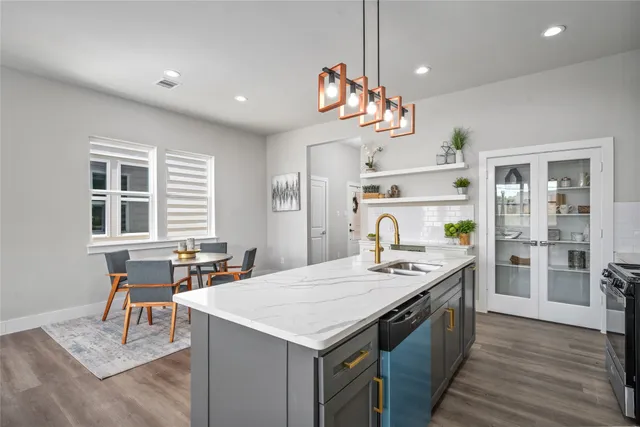a dining room with furniture and window
