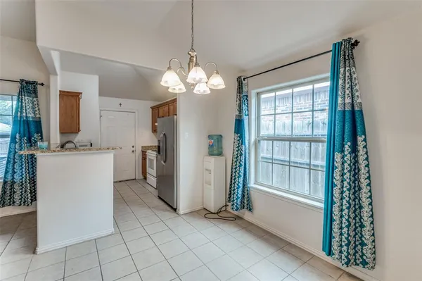 a view of a kitchen and a windows