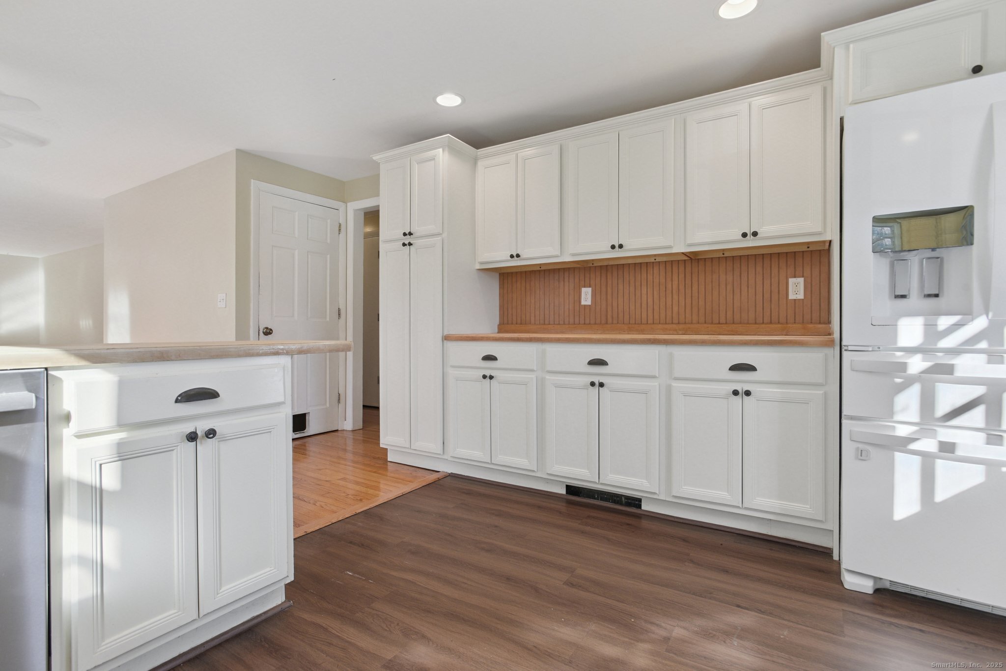 109 Valley Road Groton, CT 06340 - Photo 12 of 28 a view of a kitchen with wooden floor