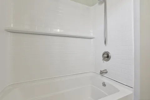 a bathroom with a bathtub