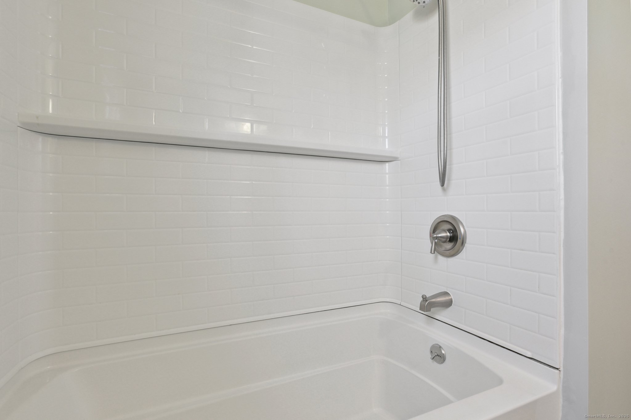 109 Valley Road Groton, CT 06340 - Photo 15 of 28 a bathroom with a bathtub