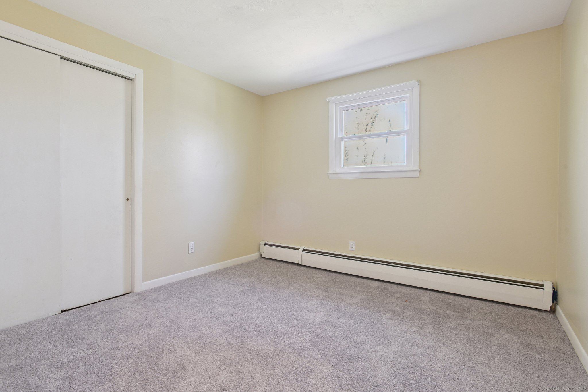 109 Valley Road Groton, CT 06340 - Photo 16 of 28 a view of an empty room with a window