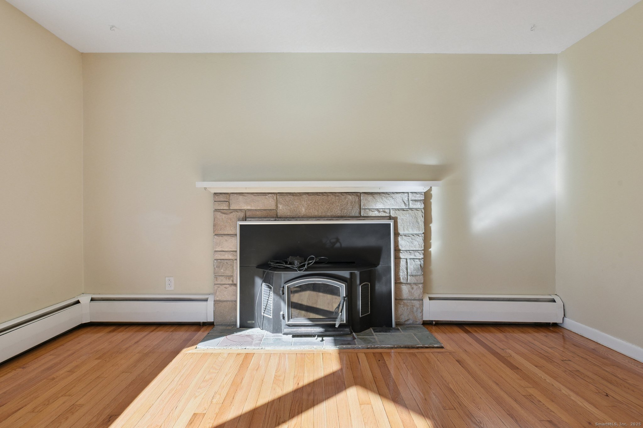 109 Valley Road Groton, CT 06340 - Photo 4 of 28 a living room with a fireplace