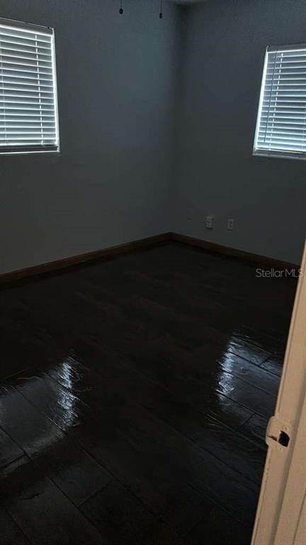 5000 Manduria Street Orlando, FL 32819 - Photo 13 of 17 a view of an empty room with a window