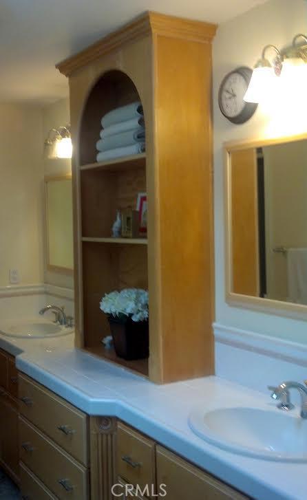 32492 Azores Road Dana Point, CA 92629 - Photo 12 of 18 a bathroom with a sink and a mirror