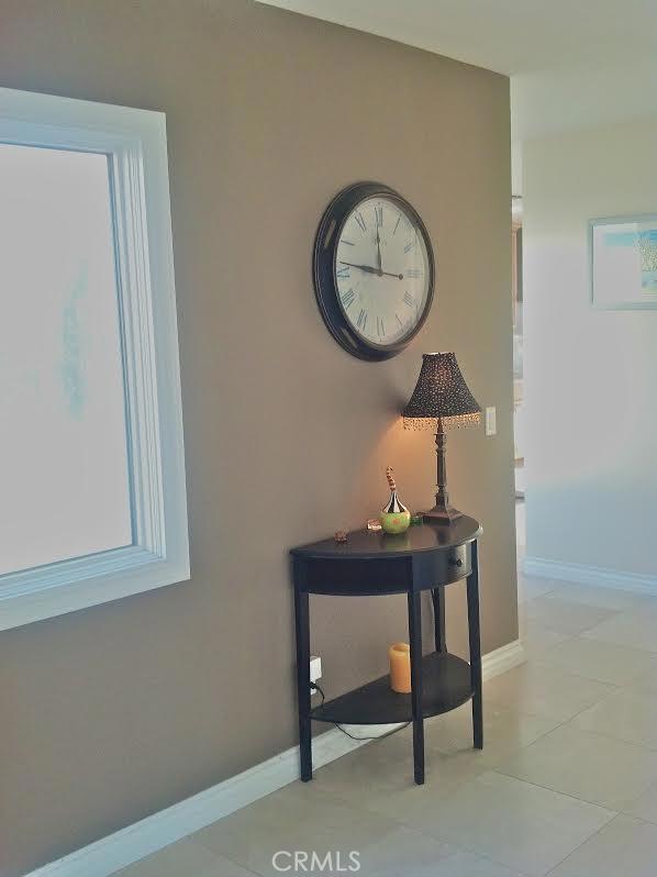 32492 Azores Road Dana Point, CA 92629 - Photo 4 of 18 a view of a room that has a mirror and a table in it