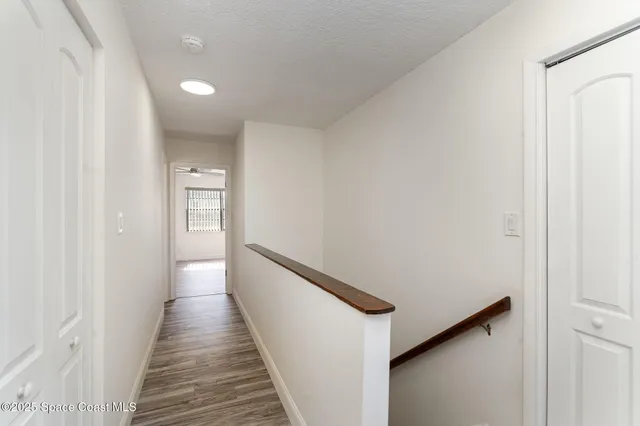 a bathroom with a toilet sink and shower