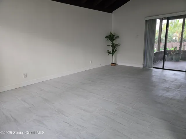 a kitchen with a sink and a window