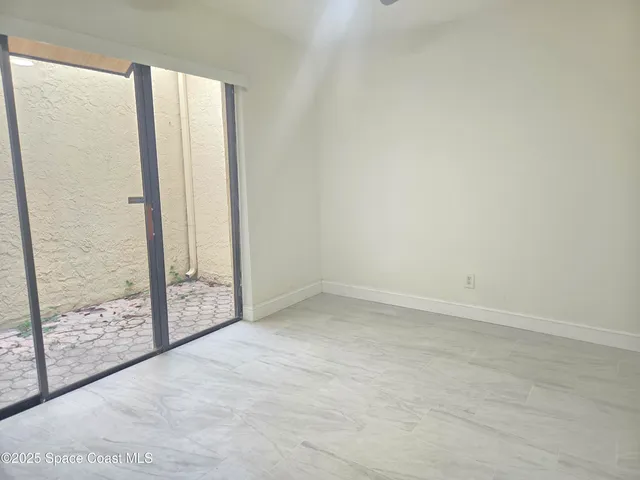 a view of empty room with window