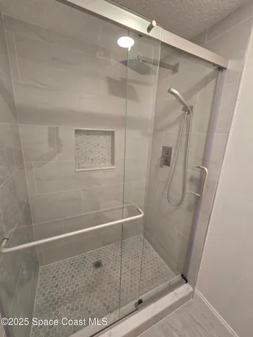 a view of small space with racks on the wall