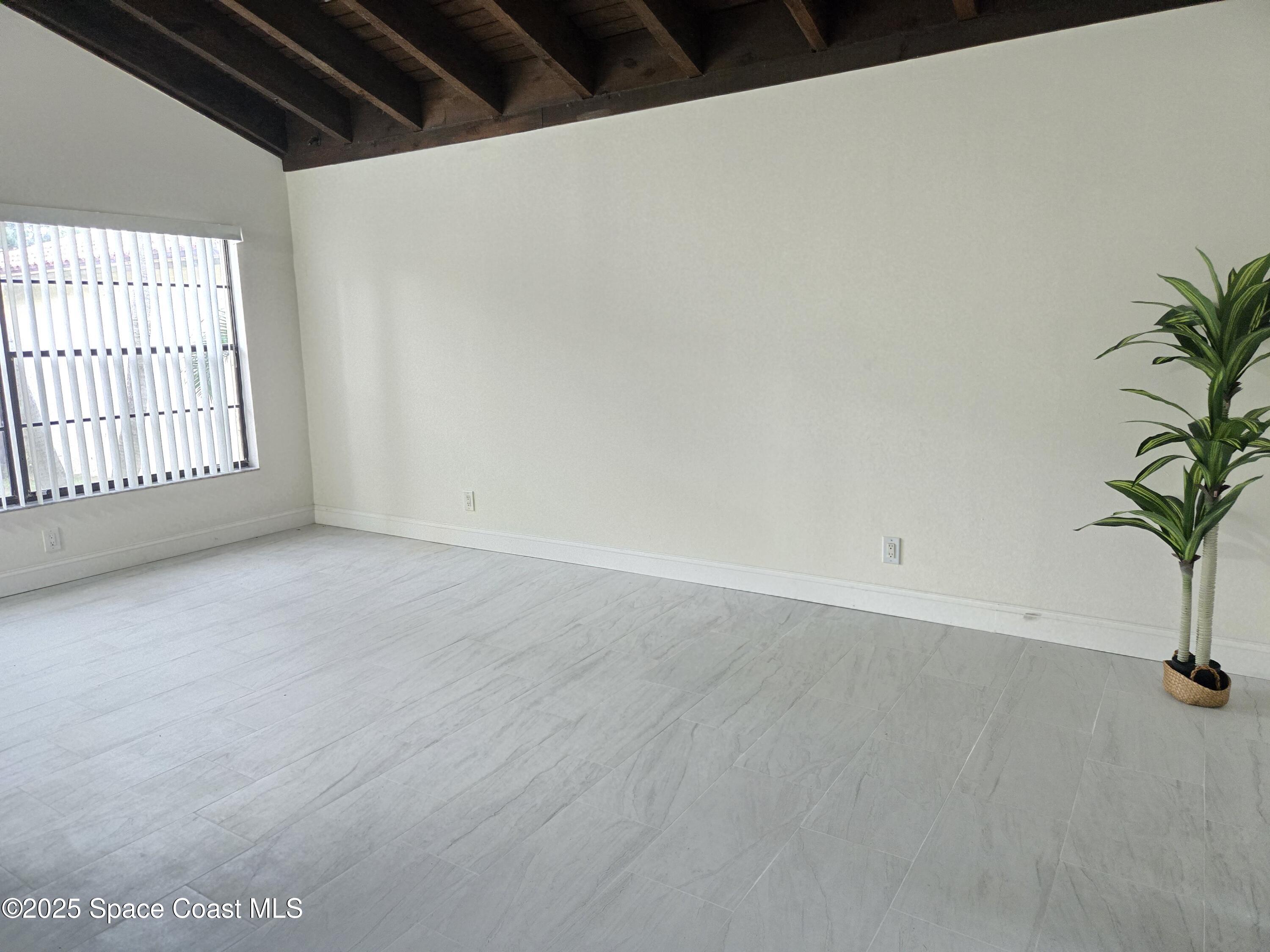 3444 Partridge Court Melbourne, FL 32935 - Photo 59 of 78 a view of empty room with window