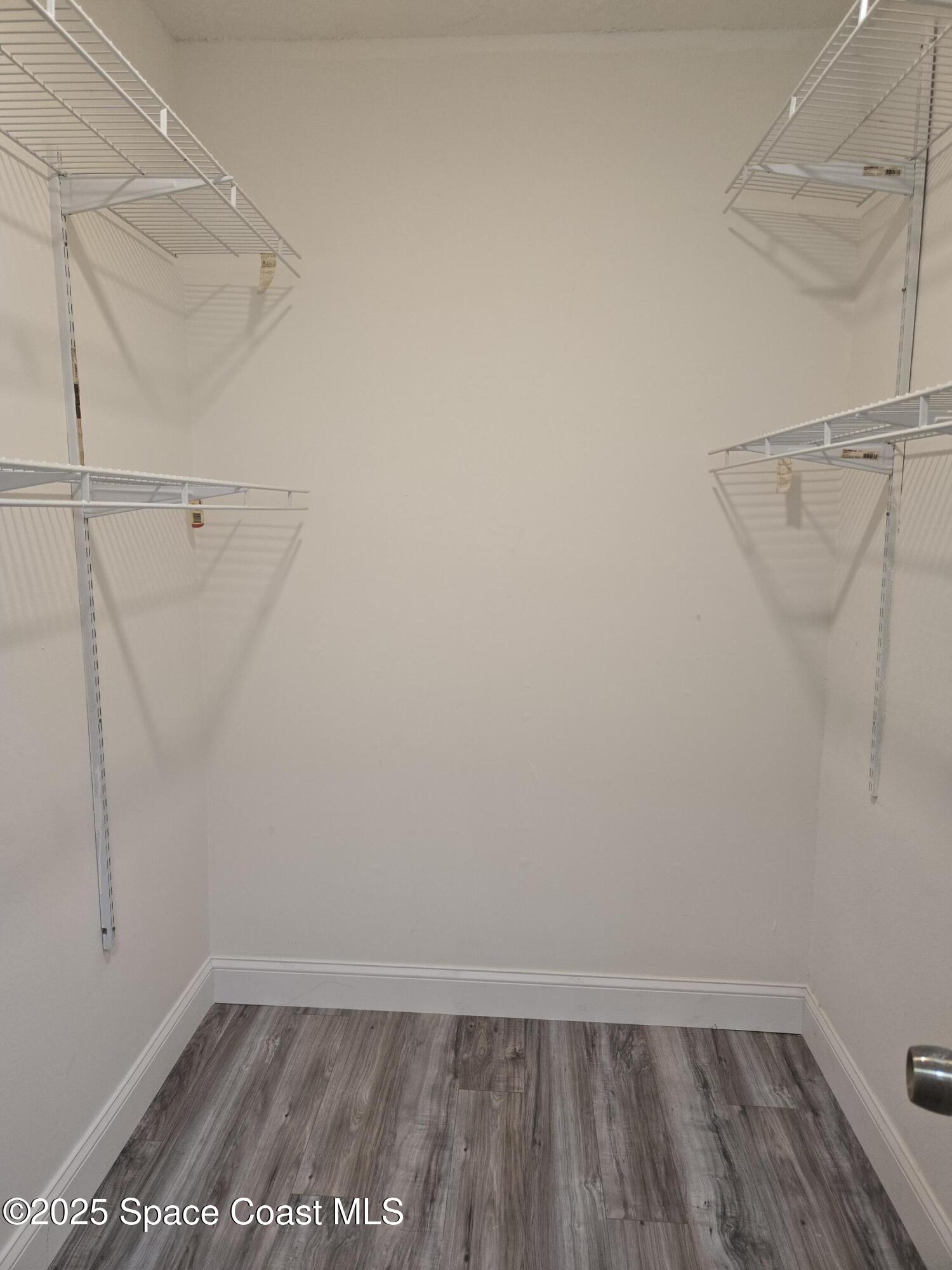3444 Partridge Court Melbourne, FL 32935 - Photo 63 of 78 a view of small space with racks on the wall