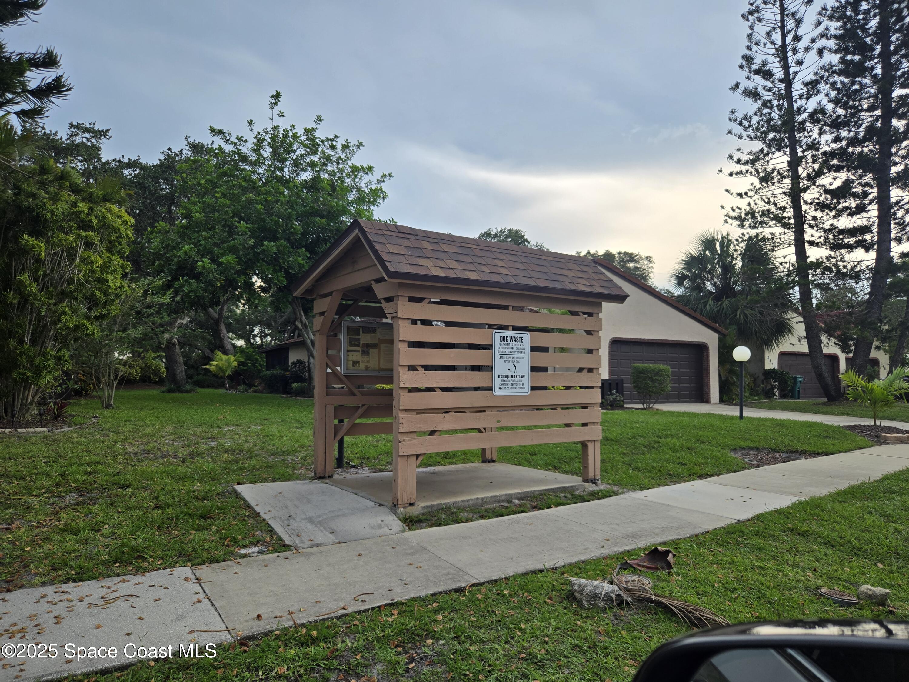 3444 Partridge Court Melbourne, FL 32935 - Photo 78 of 78 a view of a house with a yard
