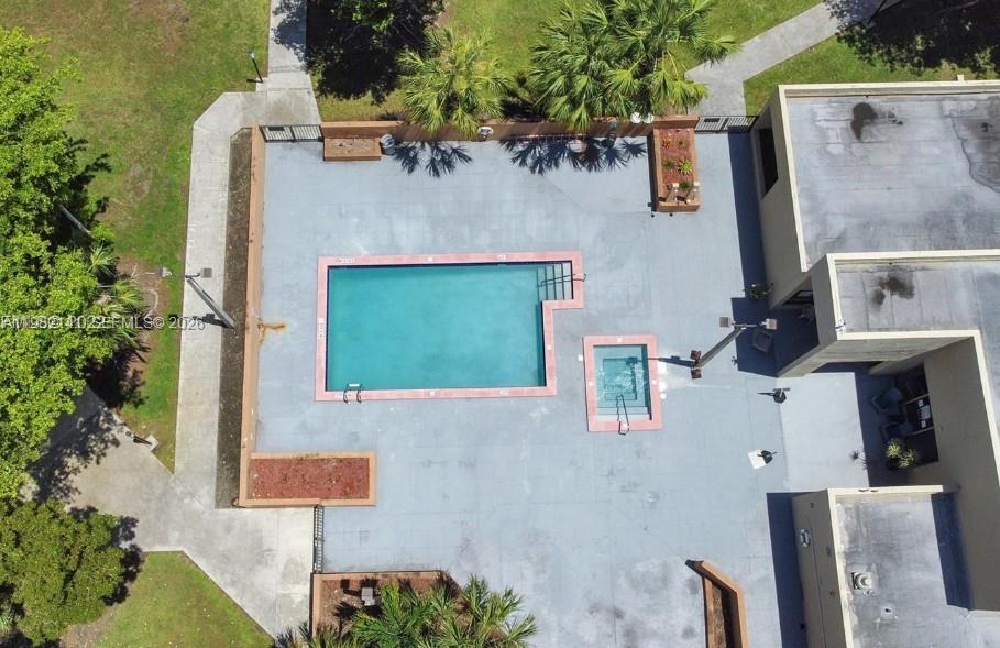 8002 Southwest 149th Avenue, Unit B201 Miami, FL 33193 - Photo 13 of 13 an aerial view of a house with pool and porch