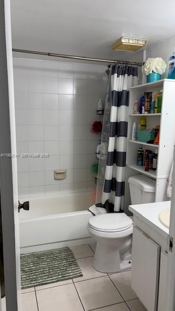 8002 Southwest 149th Avenue, Unit B201 Miami, FL 33193 - Photo 4 of 13 a bathroom with a bathtub a toilet and a shower