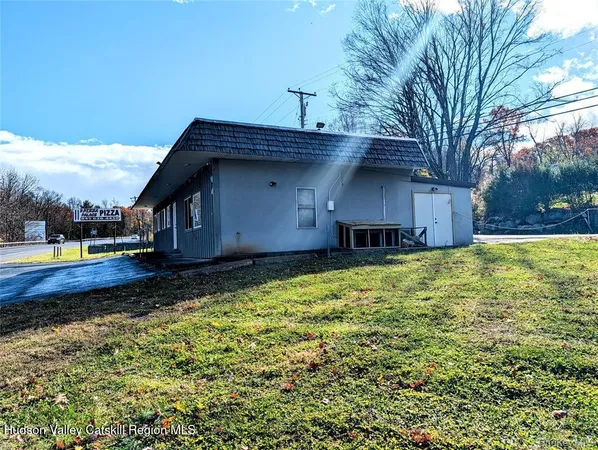 a view of a house with a swimming pool