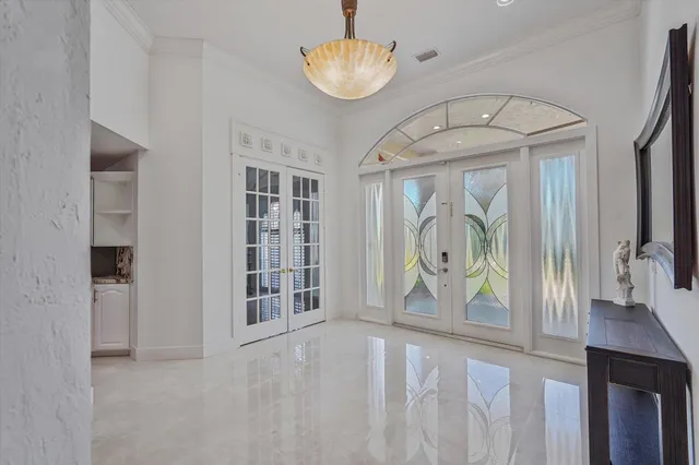 a view of an entryway with a flower pot