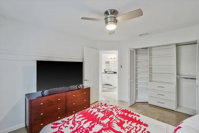 a bedroom with a bed and furniture